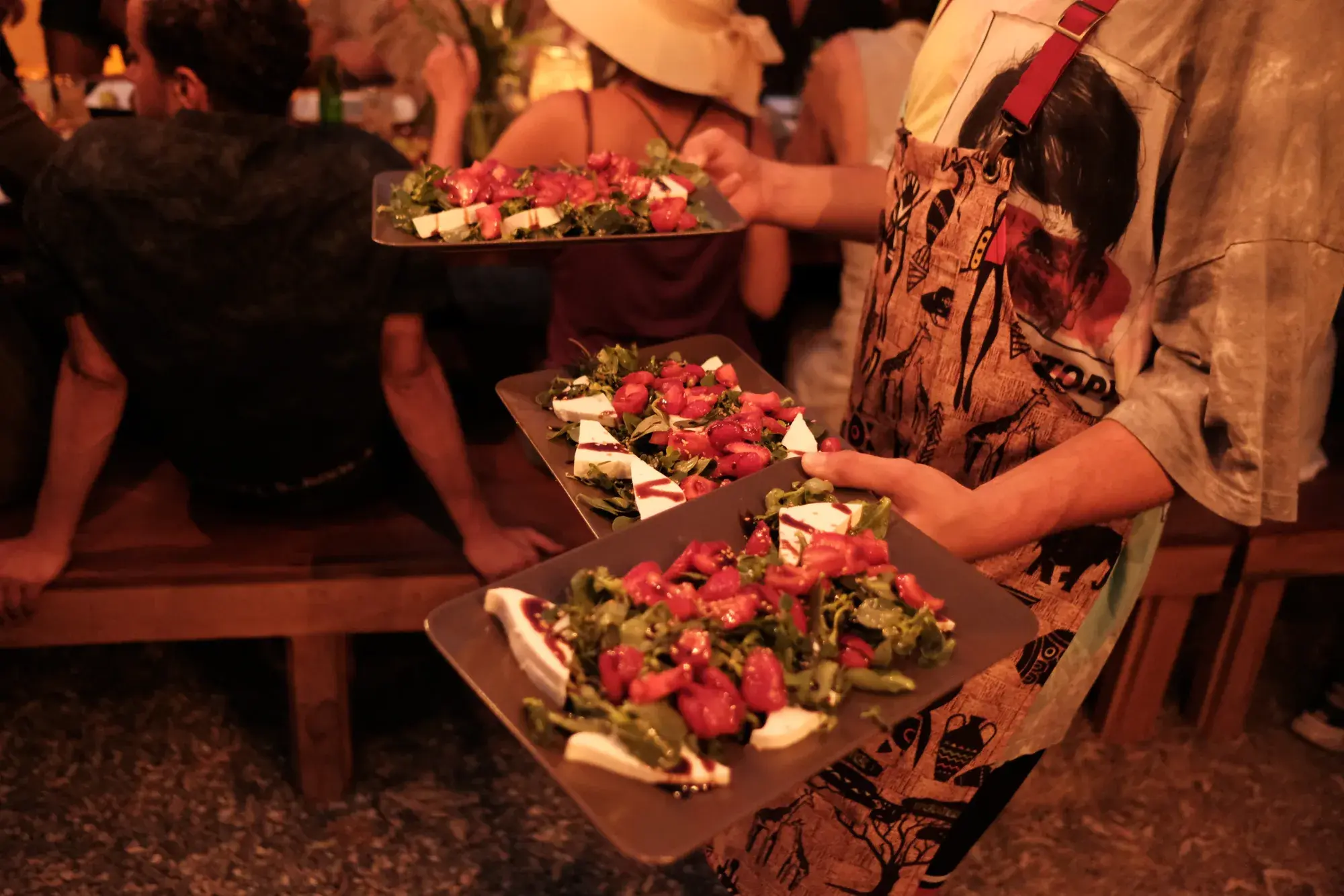 Plates being served to guests at an event