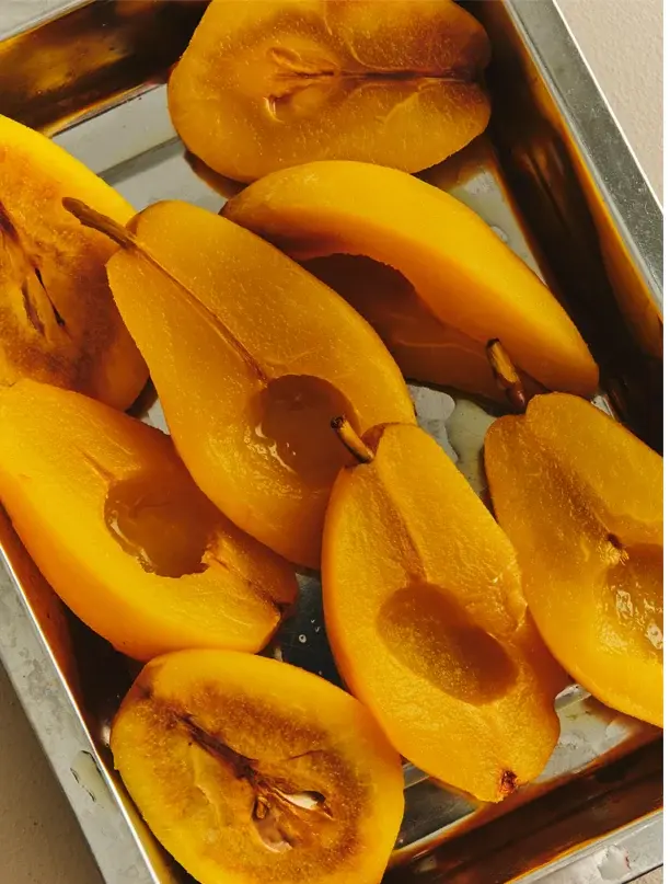 Poached pears in a tray