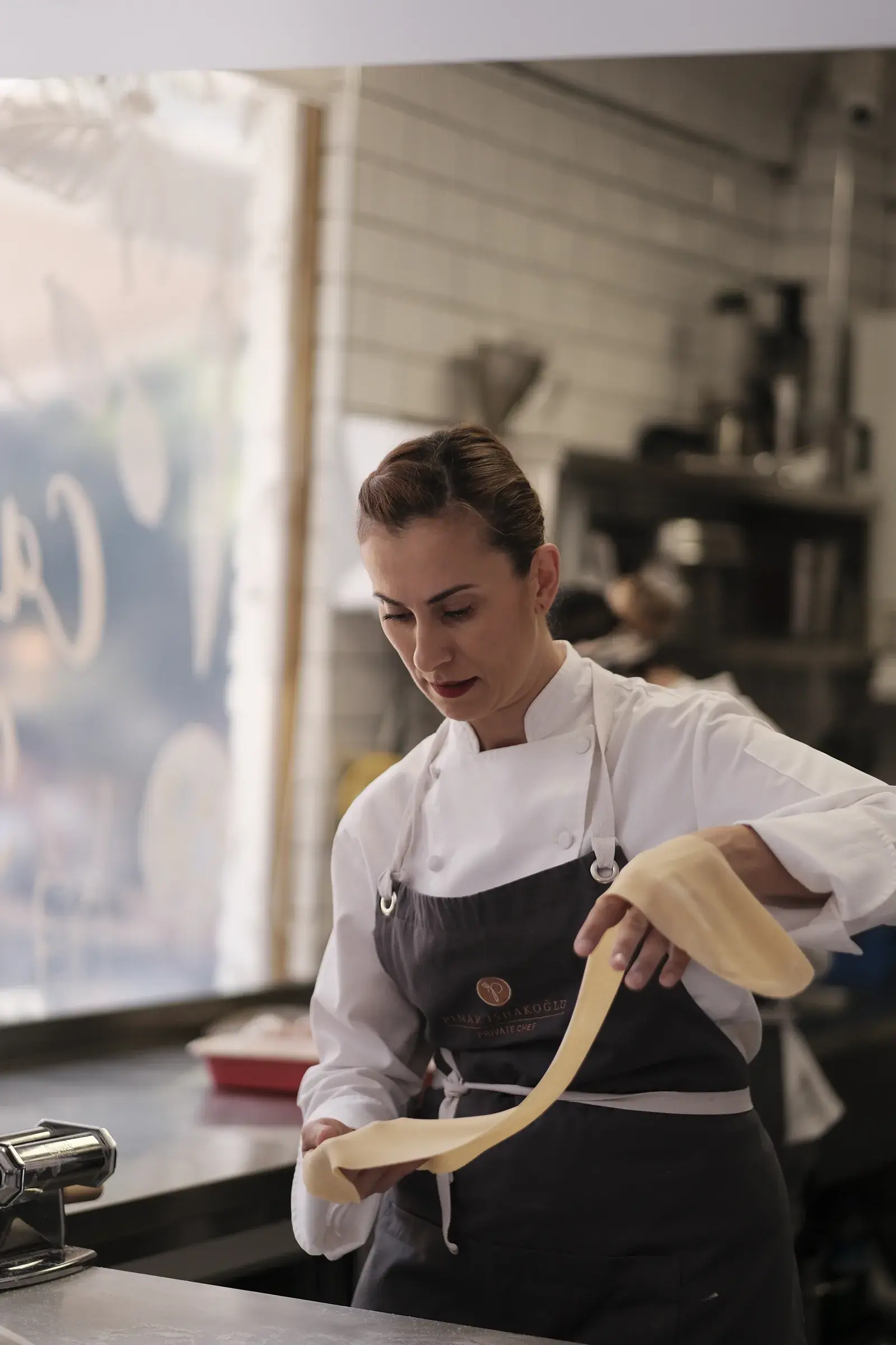 Pınar İshakoğlu preparing fresh pasta in the kitchen